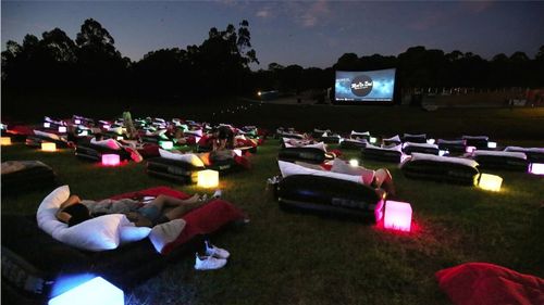 Volunteer At Mov'in Bed Outdoor Bed Cinema In Sydney